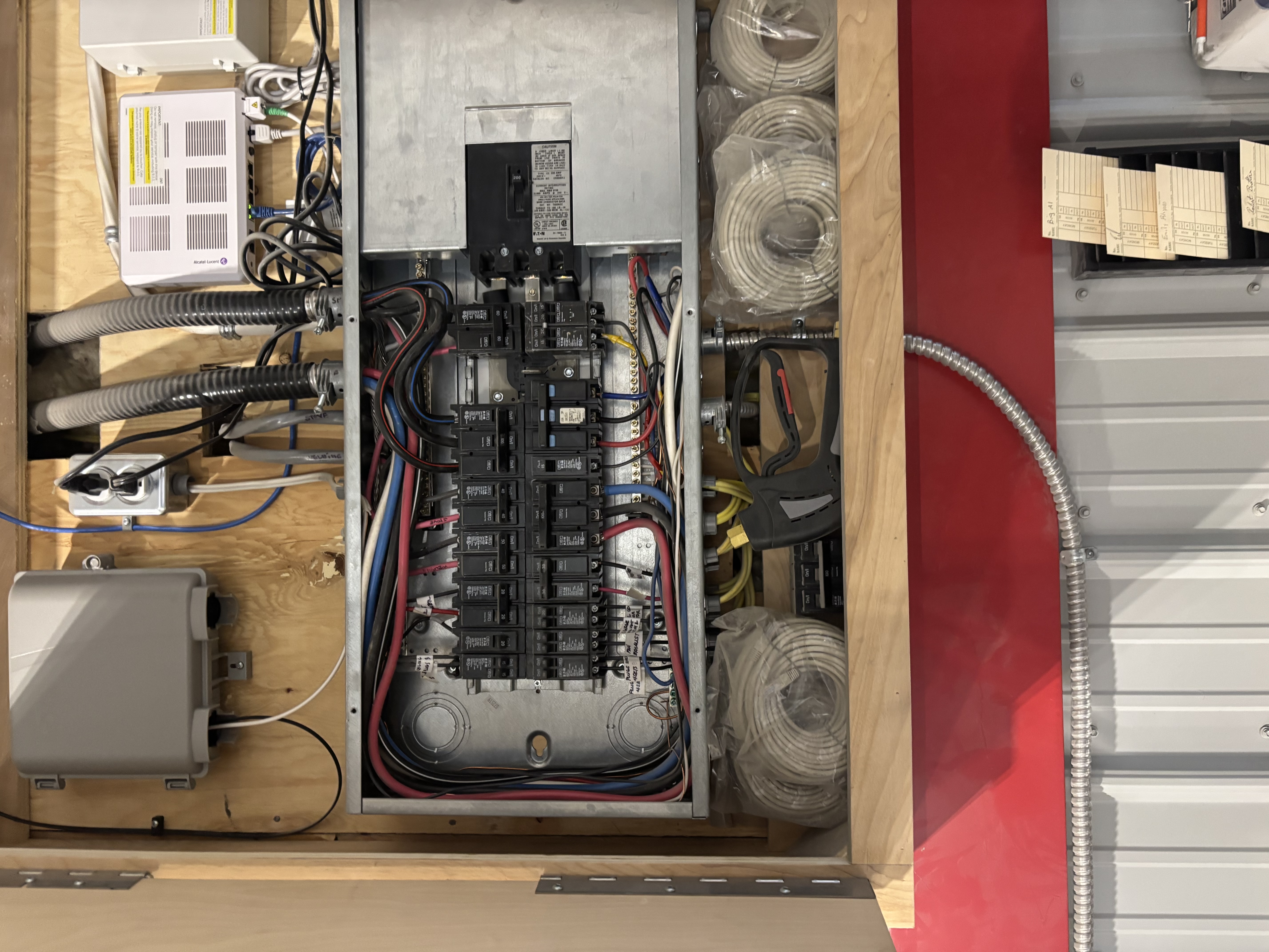 Open commercial electrical panel during troubleshooting and repair